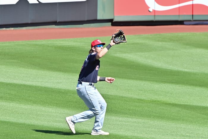 Feb 29, 2024; Tempe, Arizona, USA; Cleveland Guardians right fielder Chase DeLauter (6) catches a fly ball in the third inning against the Los Angeles Angels during a spring training game at Tempe Diablo Stadium. Mandatory Credit: Matt Kartozian-USA TODAY Sports